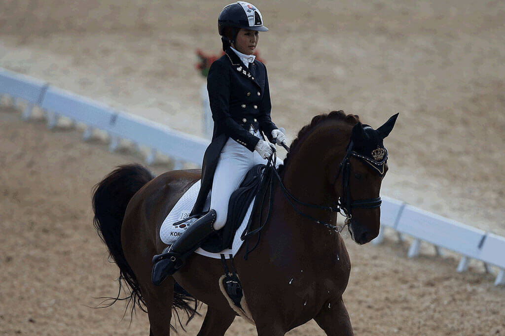 Ms Chung performing during the equestrian Dressage Team competition at the 17th Asian Games in Incheon, South Korea, on Sept 20, 2014.