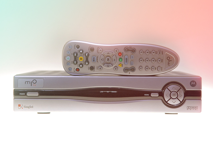 Singtel’s mioTV set-top box and remote control. The pay TV competition heats up in the industry as Singtel goes head on against StarHub for a share of the pie.