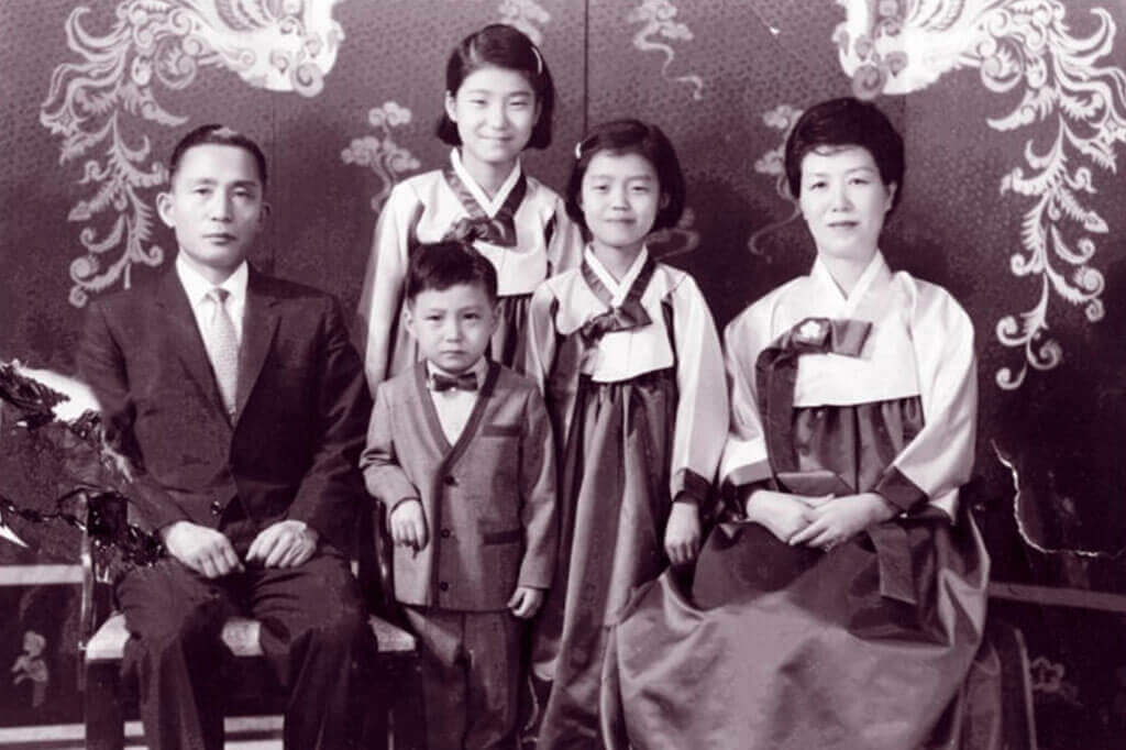 Ms Park Geun Hye in happier times pictured with her parents and her two younger siblings - sister Geun Ryong and brother Ji Man.